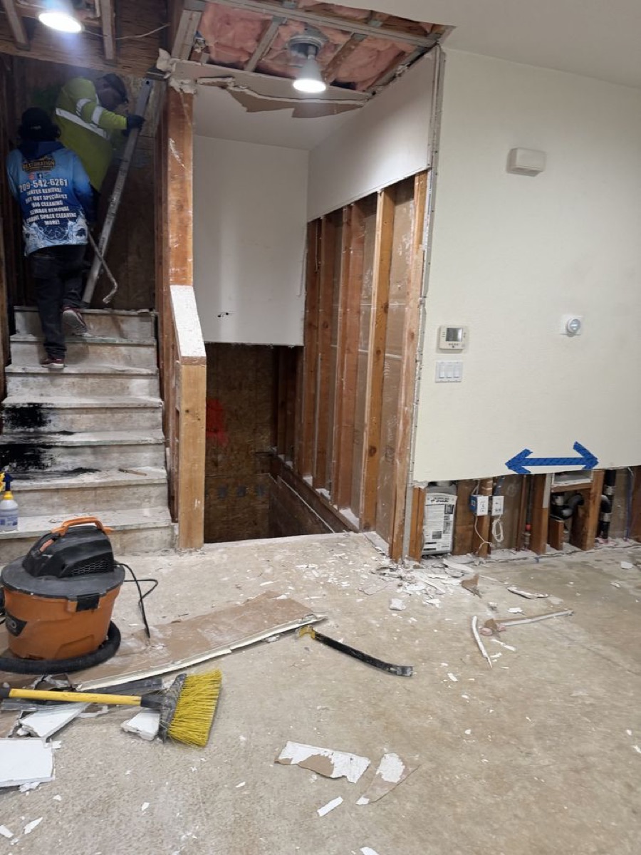 Water damage mitigation and demolition work inside a home