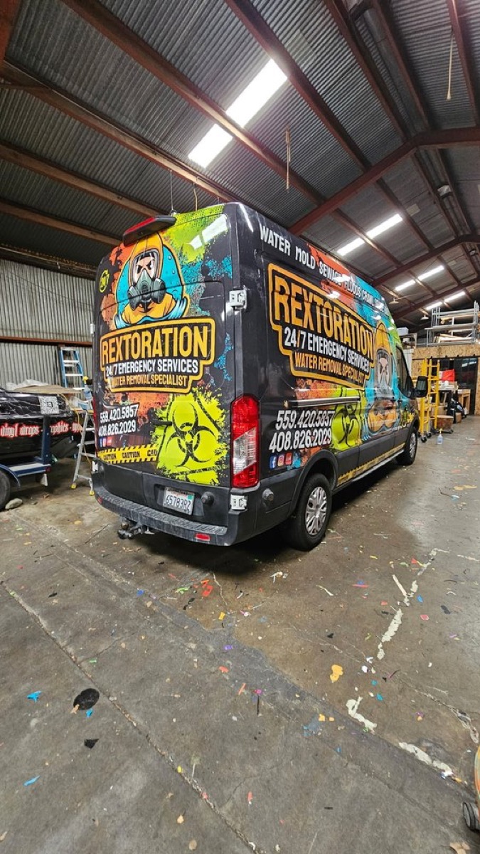 Rextoration branded emergency response van with 24/7 emergency services wrap